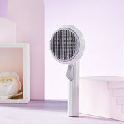 https://domiclv.com › products › new-pet-cat-brush-hot-selling-hand-held-steel-wire-self-cleaning-comb-looper-for-hair-removal

