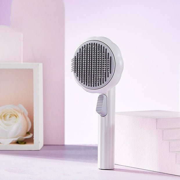 https://domiclv.com › products › new-pet-cat-brush-hot-selling-hand-held-steel-wire-self-cleaning-comb-looper-for-hair-removal

