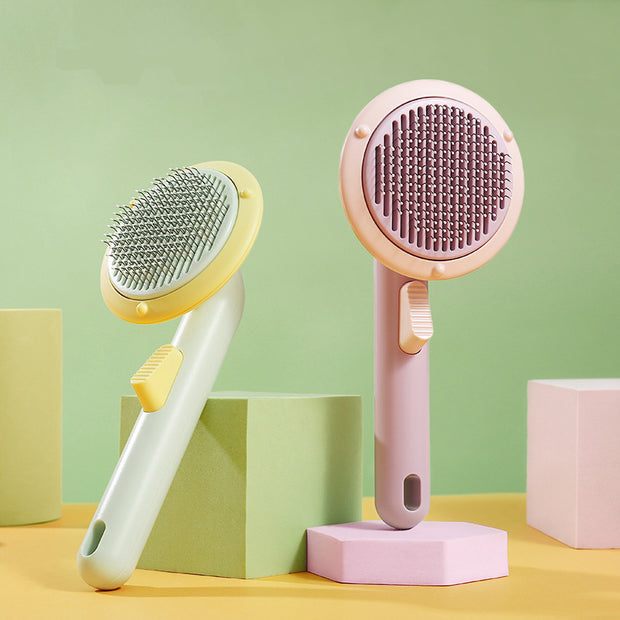 https://domiclv.com › products › new-pet-cat-brush-hot-selling-hand-held-steel-wire-self-cleaning-comb-looper-for-hair-removal

