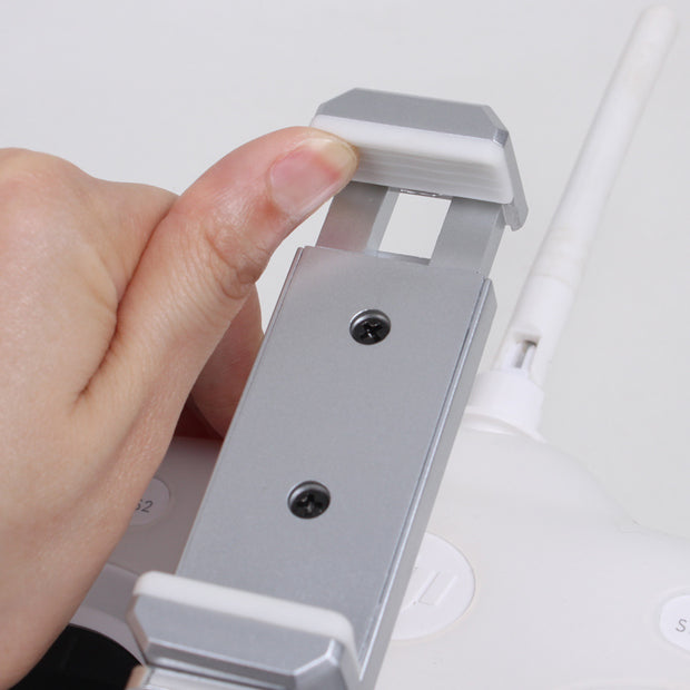 https://domiclv.com › products › standard-edition-universal-remote-control-mobile-phone-holder-ipad-tablet-uav-accessories

