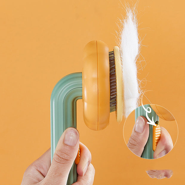 https://domiclv.com › products › new-pet-cat-brush-hot-selling-hand-held-steel-wire-self-cleaning-comb-looper-for-hair-removal

