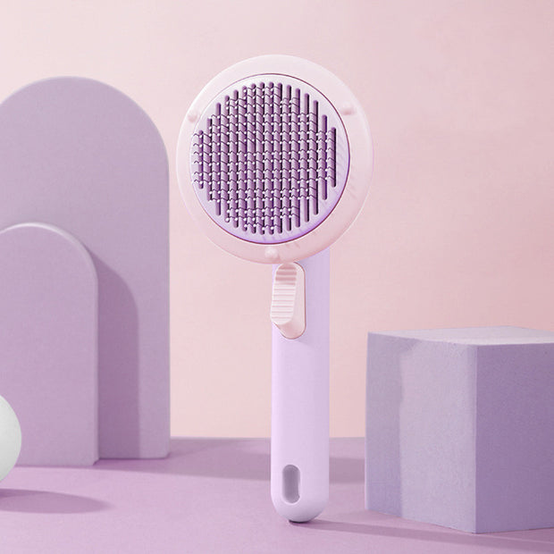 https://domiclv.com › products › new-pet-cat-brush-hot-selling-hand-held-steel-wire-self-cleaning-comb-looper-for-hair-removal

